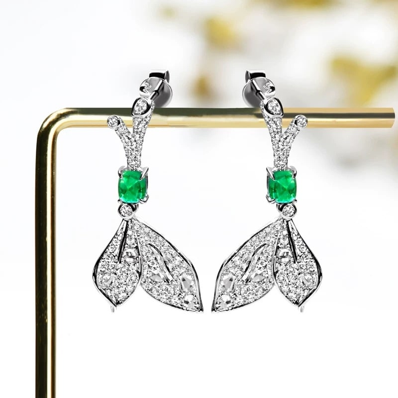 14k Gold 1.86 Ctw Vivid Green Natural Emerald & Diamond Earrings: Ref:230947131 // gold content:14k gold // main gemstone:emerald // shape:suger-loaf // carat weight:0. 8ct // color:vivid green // treatment:natural // // adjacent gemstone 2 : diamond //
