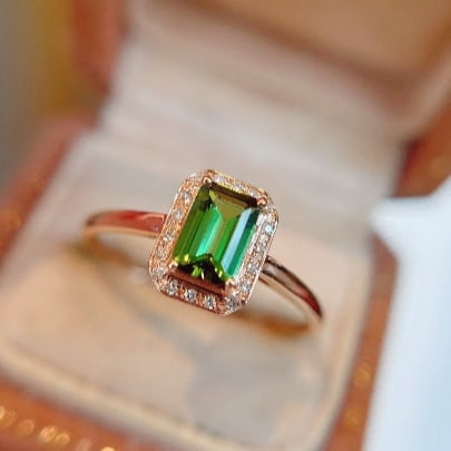 14k Gold 0.53 Ct Natural Tourmaline & Diamond Ring: Ref:230947223 // gold content:14k gold // ring size:7. 25us // // main gemstone:tourmaline // shape:octagonal // carat weight:0. 53ct // color:green // treatment:natural // // adjacent gemstone 2