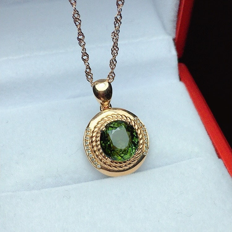 14k Gold 2.56 Ctw Natural Tourmaline & Diamond Pendant( Without Chain ): Ref:230947236 // gold content:14k gold // main gemstone:tourmaline // shape:round // carat weight:2. 5ct // color:green // treatment:natural // cut grade:g // // adjacent gemstone 2 : diamond //