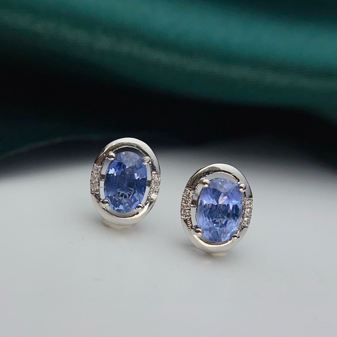 14k Gold 1.15 Ct Natural Sapphire & Diamond Earrings: Ref:230947258 // gold content:14k gold // main gemstone:sapphire // shape:oval // carat weight:1. 15ct // color:blue // treatment:natural // // adjacent gemstone 2 : diamond // number of stones:12