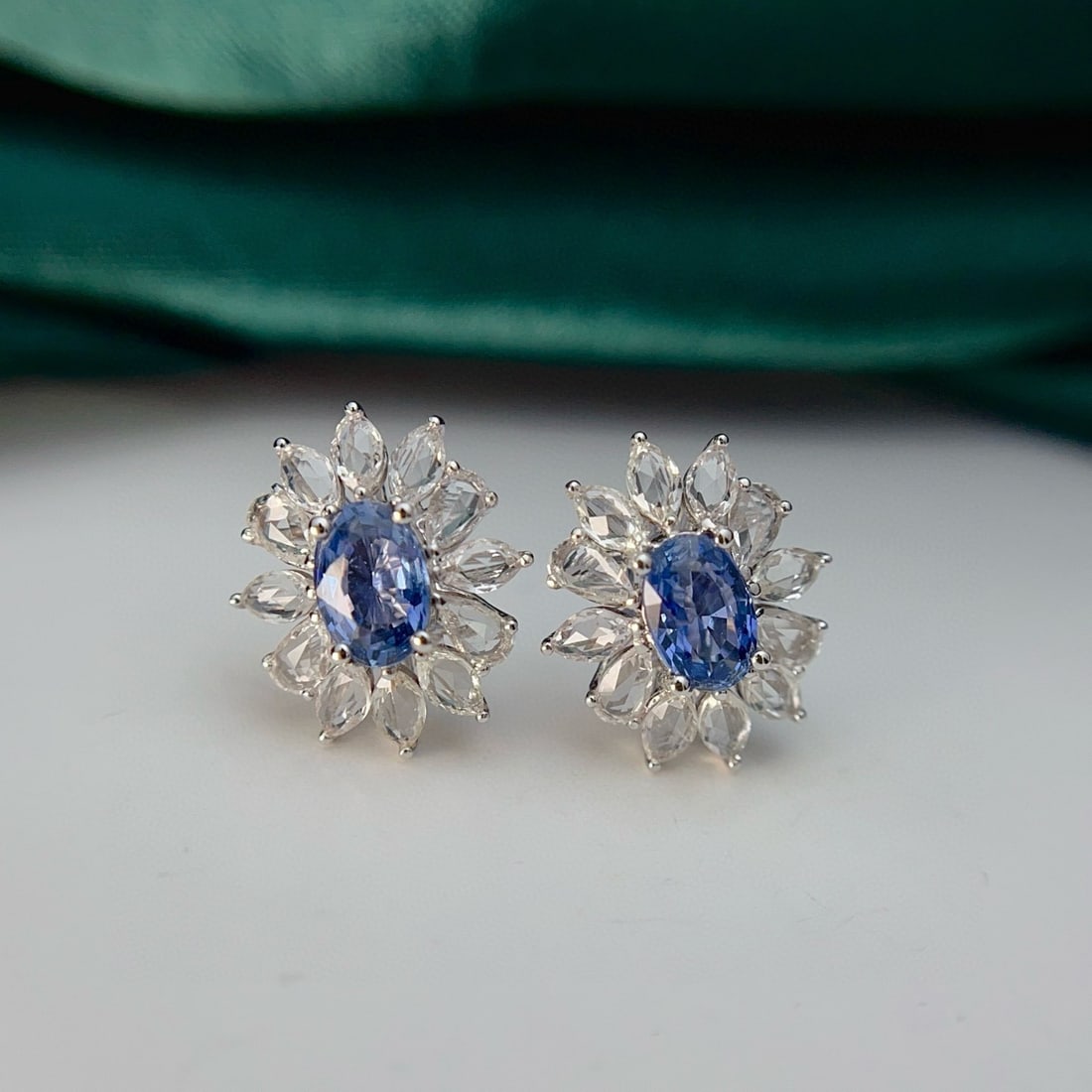 14k Gold 1.30 Ct Natural Sapphire & Sapphire Earrings: Ref:230947260 // gold content:14k gold // main gemstone:sapphire // shape:oval // carat weight:1. 30ct // color:blue // treatment:natural // // adjacent gemstone 2 : sapphire // number of stones:24