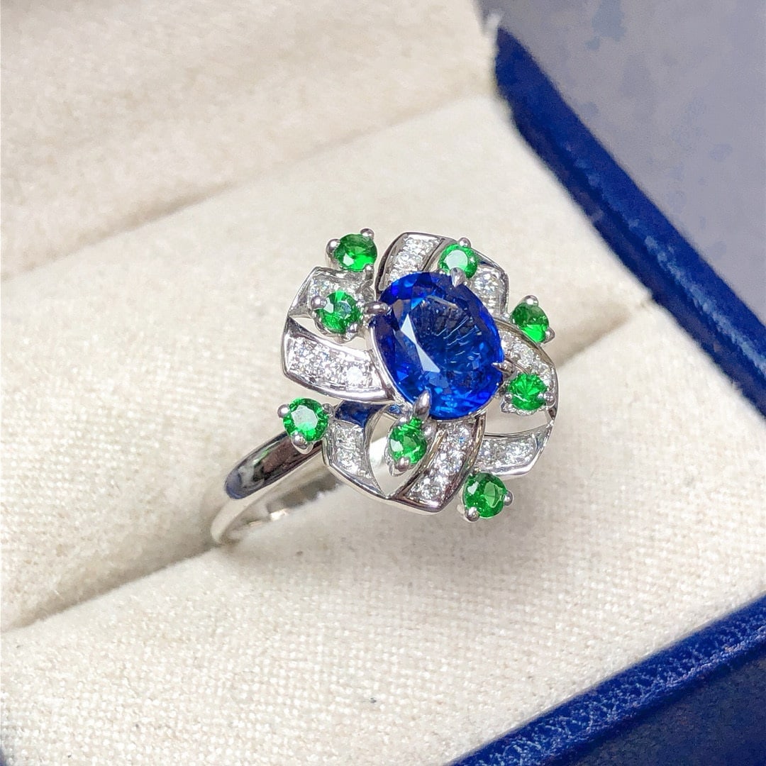 14k Gold 1.57 Ctw Natural Sapphire & Diamond Ring: Ref:230948002 // gold content:14k gold // ring size:7. 25us // // main gemstone:sapphire // shape:oval // carat weight:1. 42ct // color:cornflower blue // treatment:natural // // adjacent gemstone
