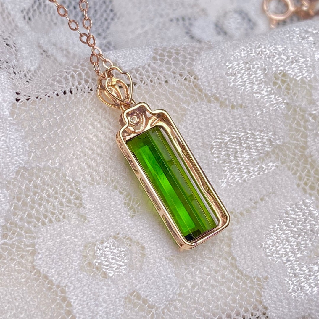 14k Gold 3.4 Ct Natural Tourmaline & Diamond Pendant( Without Chain ): Ref:230948032 // gold content:14k gold // main gemstone:tourmaline // shape:octagonal // carat weight:3. 4ct // color:green // treatment:natural // // adjacent gemstone 2 : diamond // number of