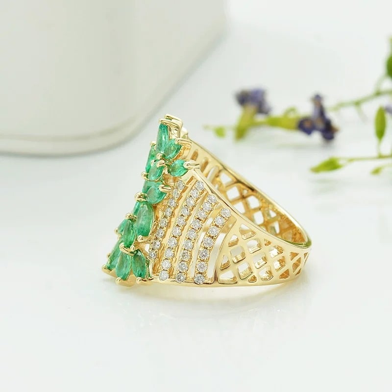 14k Gold 2.15 Ctw Natural Emerald & Diamond Ring: Ref:230948035 // gold content:14k gold // ring size:7. 25us // // main gemstone:emerald // shape:marquise // carat weight:1. 61ct // color:green // treatment:natural // // adjacent gemstone 2 :