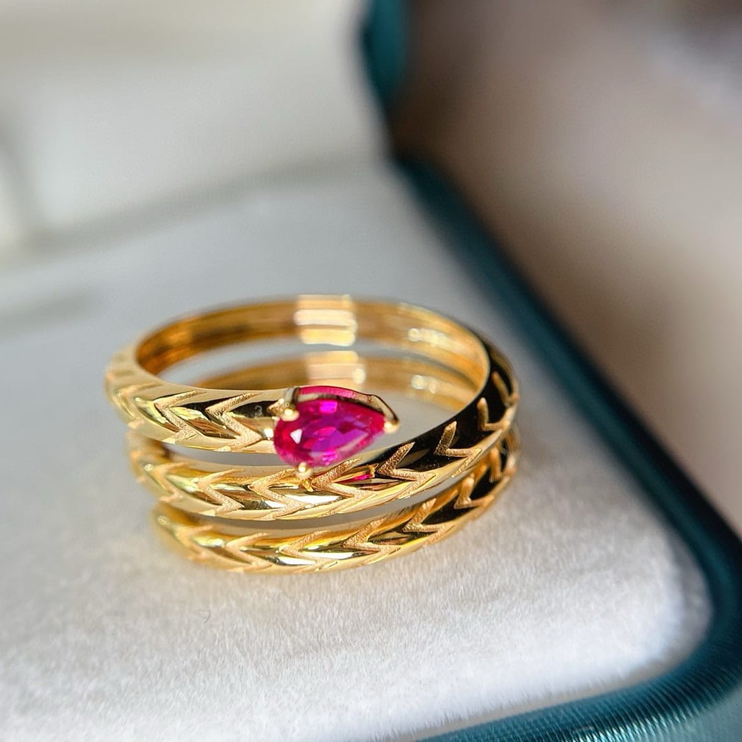 14k Gold 0.38 Ct Natural Ruby Ring: Ref:230948044 // gold content:14k gold // ring size:7. 25us // // main gemstone:ruby // shape:pear // carat weight:0. 38ct // color:red // treatment:natural // Low Estimate: 3700Condition: NewHigh