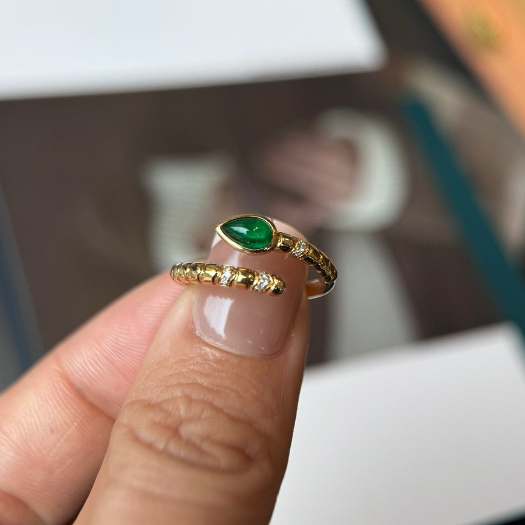 14k Gold 0.59 Ctw Vivid Green Natural Emerald & Diamond Ring: Ref:230948261 // gold content:14k gold // ring size:7. 25us // // main gemstone:emerald // shape:pear // carat weight:0. 57ct // color:vivid green // treatment:natural // // adjacent gemstone 2 :