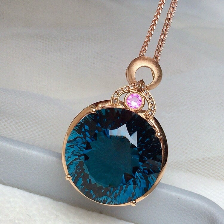 14k Gold 19.65 Ct Natural Topaz & Diamond Pendant( Without Chain ): Ref:230948271 // gold content:14k gold // main gemstone:topaz // shape:round // carat weight:19. 65ct // color:blue // treatment:natural // cut grade:g // // adjacent gemstone 2 : diamond // number