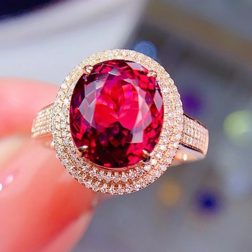 14k Gold 5.9 Ct Natural Tourmaline & Diamond Ring: Ref:230948443 // gold content:14k gold // ring size:7. 25us // // main gemstone:tourmaline // shape:oval // carat weight:5. 9ct // color:red // treatment:natural // // adjacent gemstone 2 : diamond //