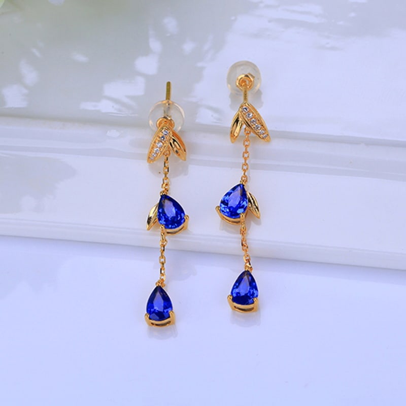 14k Gold 2.21 Ct Natural Sapphire & Diamond Earrings: Ref:230955028 // gold content:14k gold // main gemstone:sapphire // shape:pear // carat weight:2. 21ct // color:blue // treatment:natural // // adjacent gemstone 2 : diamond // shape:round //
