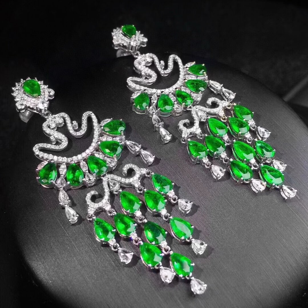 14k Gold 15.8 Ctw Vivid Green Natural Emerald & Diamond Earrings: Ref:230955055 // gold content:14k gold // main gemstone:emerald // shape:pear // carat weight:12ct // color:vivid green // treatment:natural // // adjacent gemstone 2 : diamond // shape:multiply //