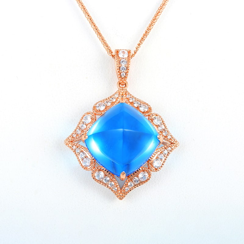 14k Gold 23.81 Ctw Natural Topaz & Sapphire Pendant( Without Chain ): Ref:230955140 // gold content:14k gold // main gemstone:topaz // shape:suger-loaf // carat weight:23. 07ct // color:blue // treatment:natural // // adjacent gemstone 2 : sapphire // number of