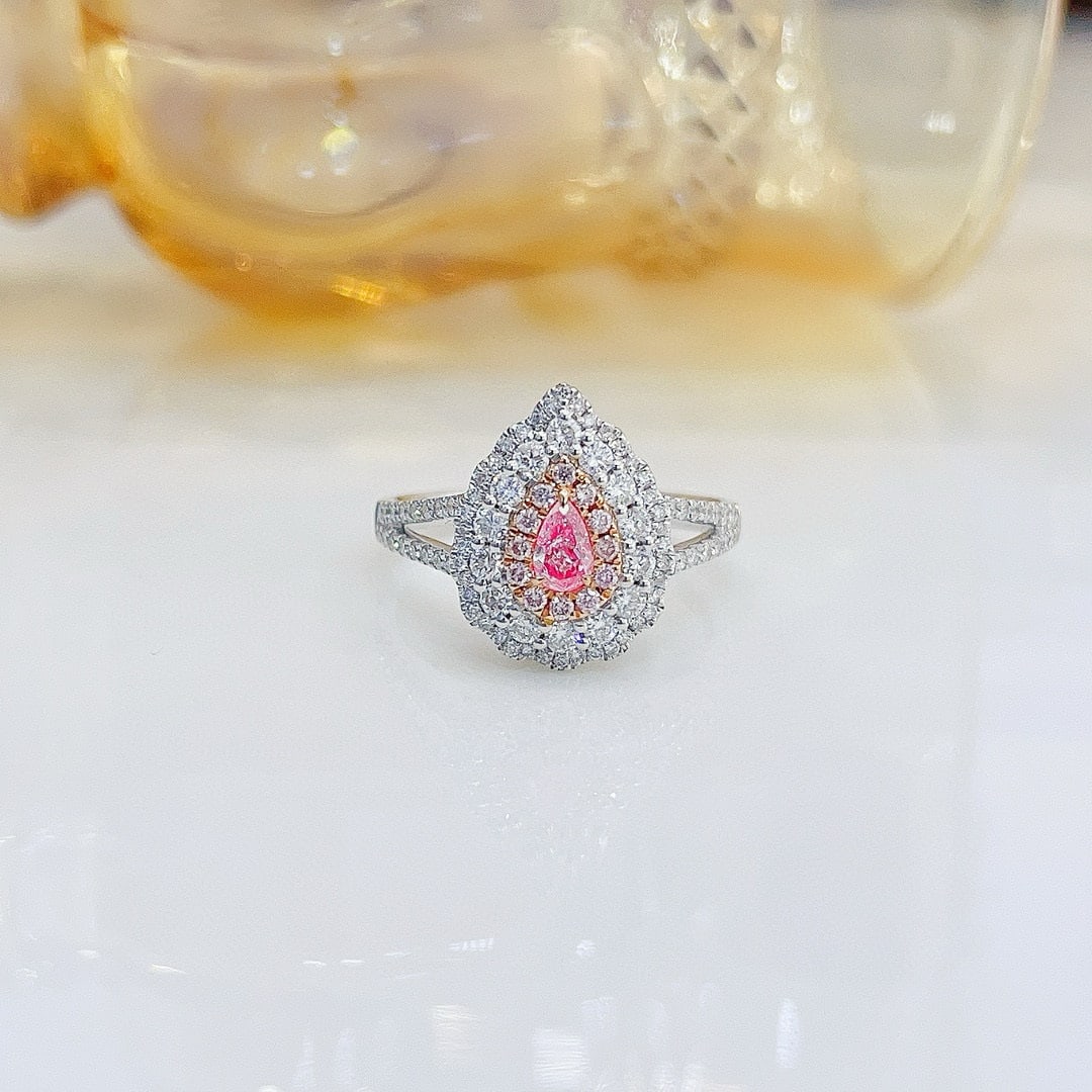 14k Gold 0.84 Ctw Natural Pink Diamond & Diamond Ring: Ref:230956196 // gold content:14k gold // ring size:7. 25us // // main gemstone:pink diamond // shape:pear // carat weight:0. 17ct // color:pink // treatment:natural // // adjacent gemstone 2 : diamon