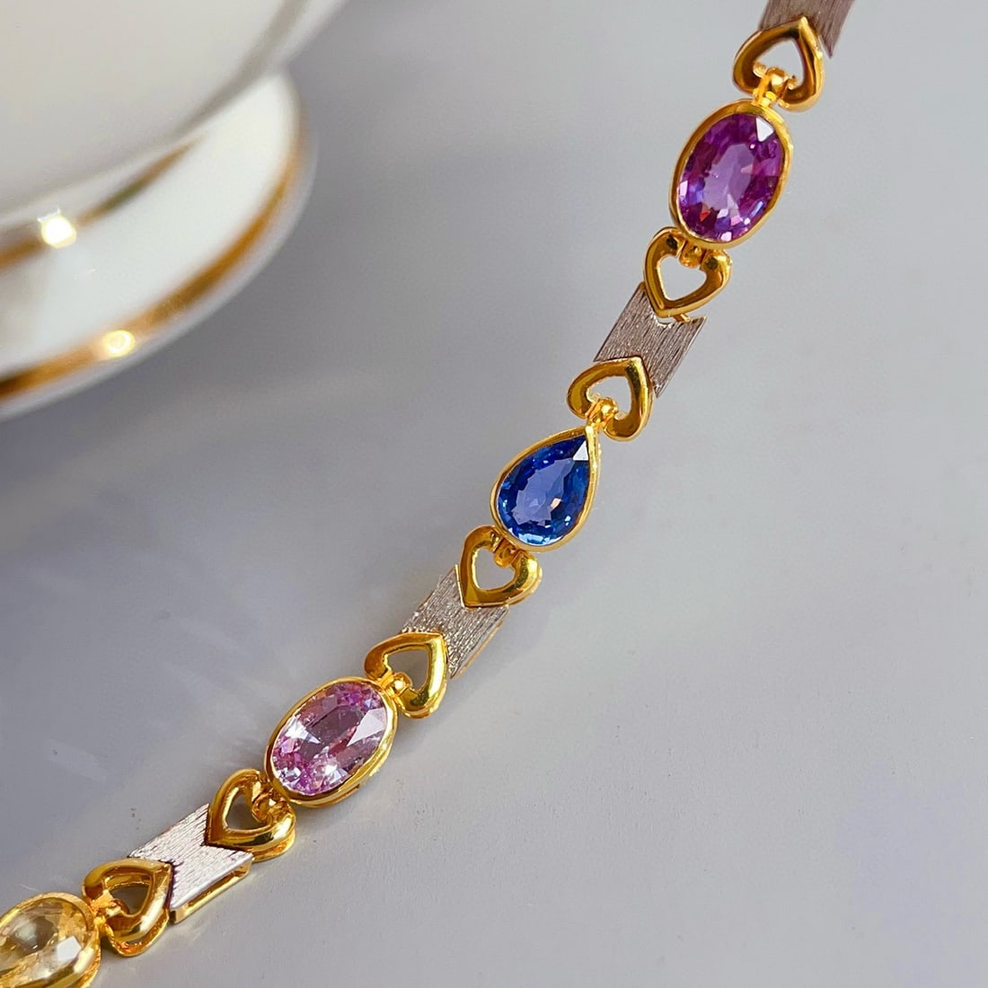 14k Gold 3.38 Ct Natural Sapphire Bracelet: Ref:230951022 // gold content:14k gold // main gemstone:sapphire // shape:multiply // carat weight:3. 38ct // color:color // treatment:natural // Condition: NewLow Estimate: 13000.00High Estimate:
