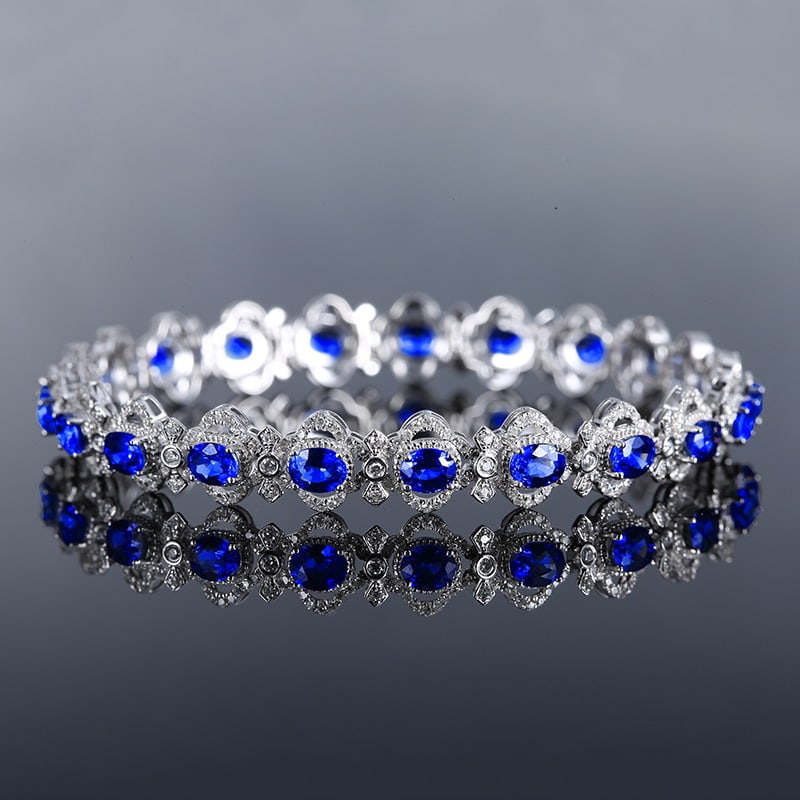 14k Gold 9.38 Ctw Natural Sapphire & Diamond Bracelet: Ref:230951060 // gold content:14k gold // main gemstone:sapphire // shape:oval // carat weight:7. 87ct // color:cornflower blue // treatment:natural // // adjacent gemstone 2 : diamond // number of st