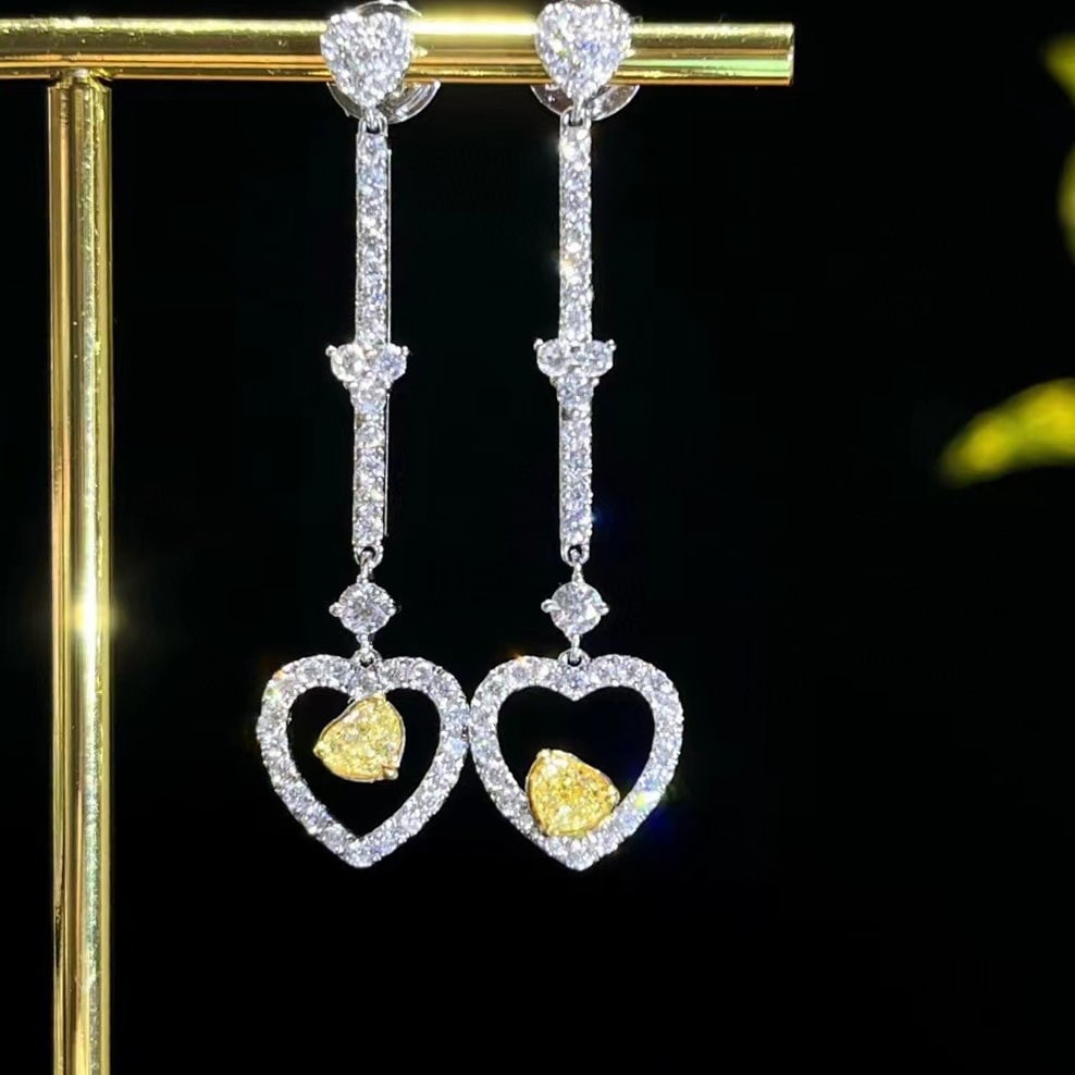 14k Gold 1.26 Ctw Natural Yellow Diamond & Diamond Earrings: Ref:230951082 // gold content:14k gold // main gemstone:yellow diamond // shape:heart // carat weight:0. 34ct // color:yellow // treatment:natural // // adjacent gemstone 2 : diamond // shape:round