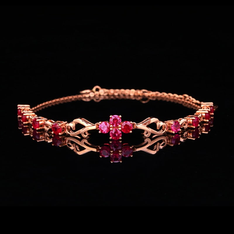 14k Gold 2.3 Ct Natural Ruby Bracelet: Ref:230951093 // gold content:14k gold // main gemstone:ruby // shape:round // carat weight:2. 3ct // color:red // treatment:natural // cut grade:g // Condition: New Low Estimate: 2200.00 High Estima