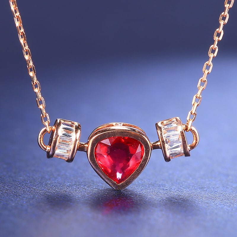 14k Gold 0.55 Ctw Natural Ruby & Diamond Necklace: Ref:230951100 // gold content:14k gold // main gemstone:ruby // shape:pear // carat weight:0. 48ct // color:red // treatment:natural // // adjacent gemstone 2 : diamond // number of stones:12 //