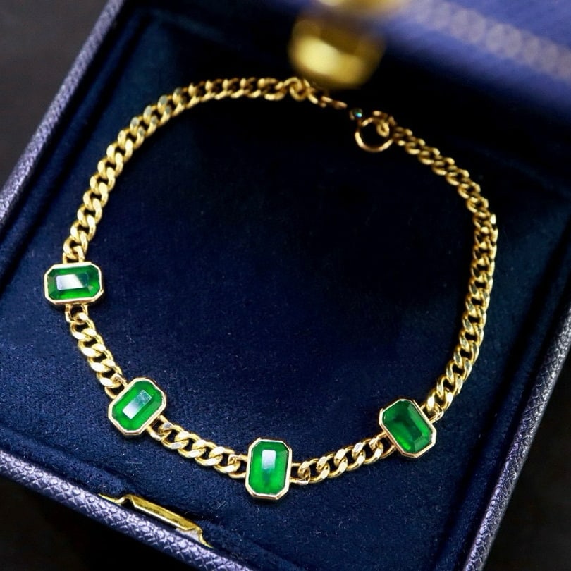 14k Gold 2.6 Ct Vivid Green Natural Emerald Bracelet: Ref:230951119 // gold content:14k gold // main gemstone:emerald // shape:octagonal // carat weight:2. 6ct // color:vivid green // treatment:natural // Condition: NewLow Estimate: 8800.00High