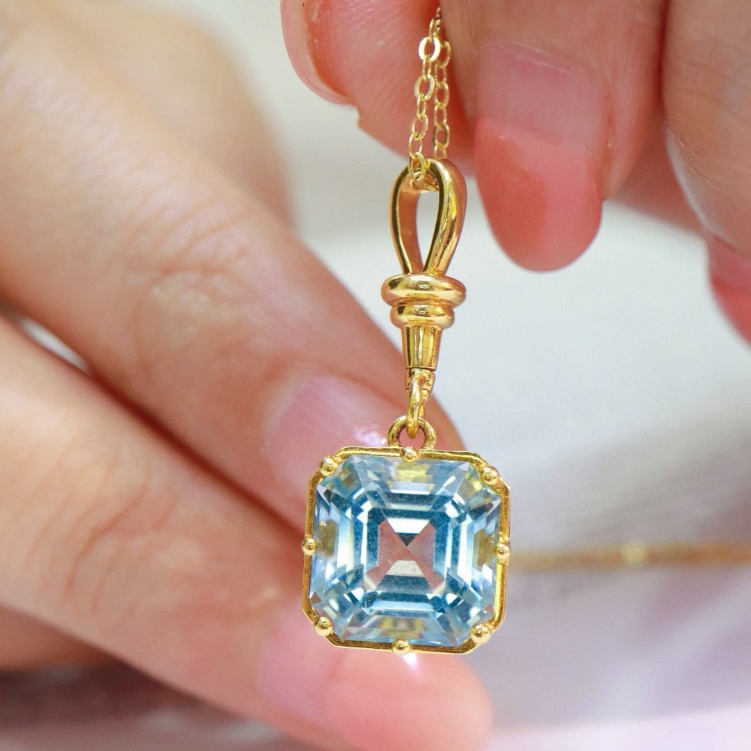 14k Gold 5.45 Ct Natural Aquamarine Pendant( Without Chain ): Ref:230951129 // gold content:14k gold // main gemstone:aquamarine // shape:asscher // carat weight:5. 45ct // color:blue // treatment:natural // Condition: NewLow Estimate: 5300.00High Estimate: