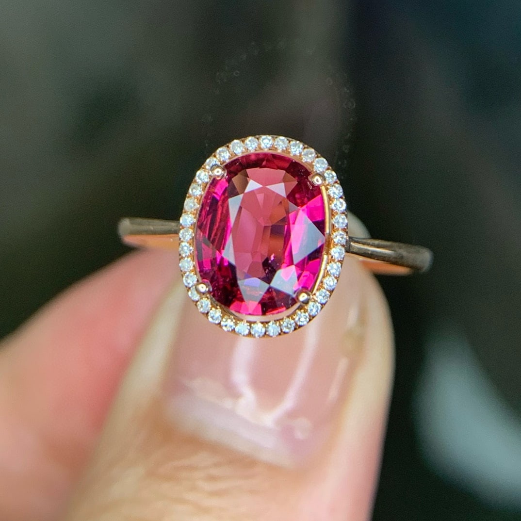 14k Gold 1.4 Ct Natural Tourmaline & Diamond Ring: Ref:230951144 // gold content:14k gold // ring size:7. 25us // // main gemstone:tourmaline // shape:oval // carat weight:1. 4ct // color:red // treatment:natural // // adjacent gemstone 2 :