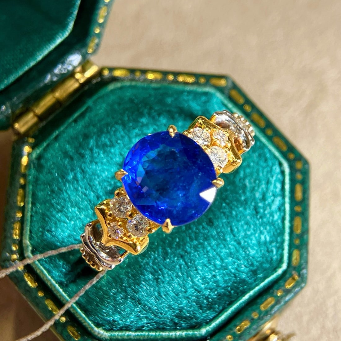 14k Gold 2.27 Ctw Vivid Blue Natural Sapphire & Diamond Ring: Ref:230951152 // gold content:14k gold // ring size:7. 25us // // main gemstone:sapphire // shape:oval // carat weight:2. 09ct // color:vivid blue // treatment:natural // // adjacent gemstone 2 :