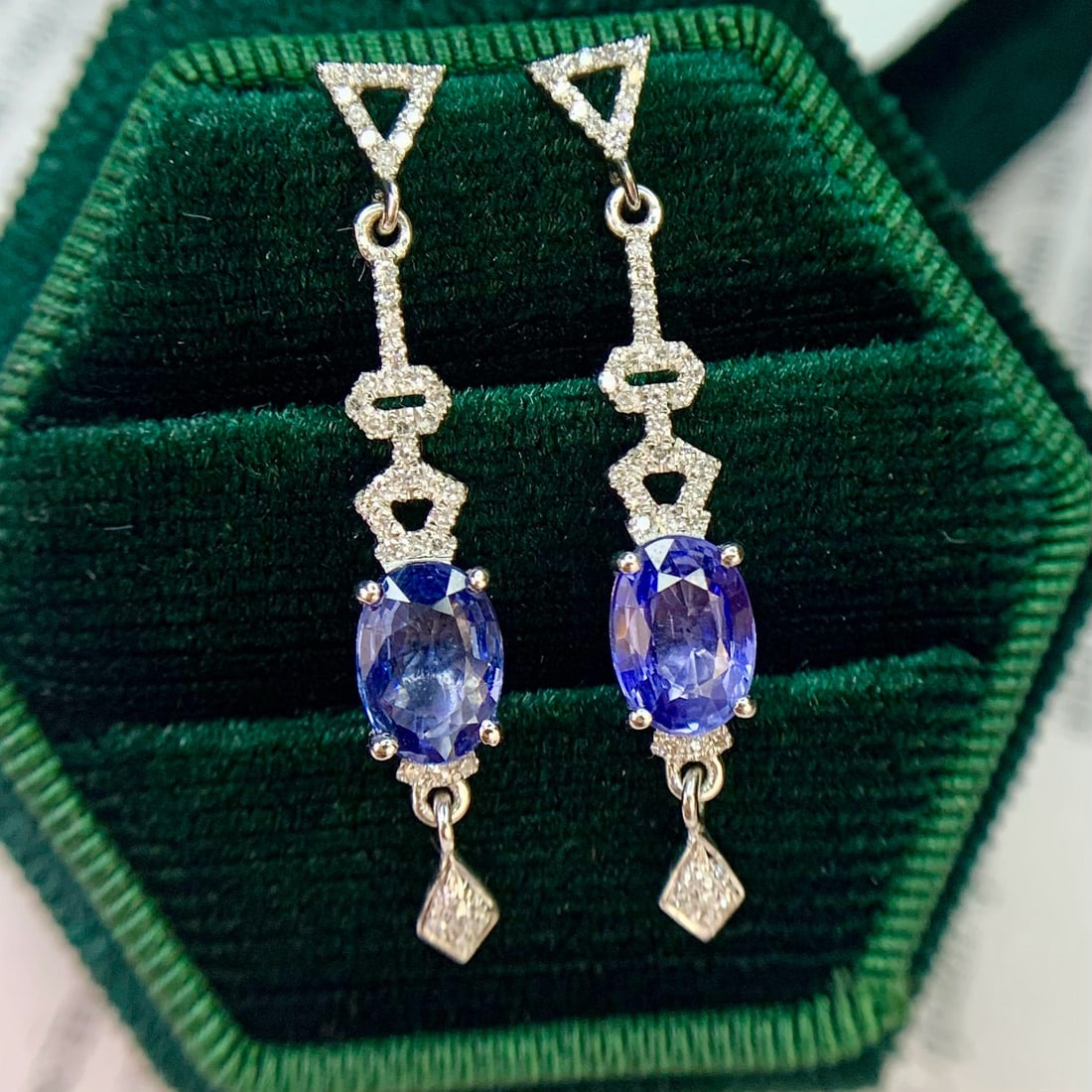 14k Gold 2.1 Ct Natural Tanzanite & Diamond Earrings: Ref:230951161 // gold content:14k gold // main gemstone:tanzanite // shape:oval // carat weight:2. 1ct // color:blue // treatment:natural // // adjacent gemstone 2 : diamond // number of stones:88