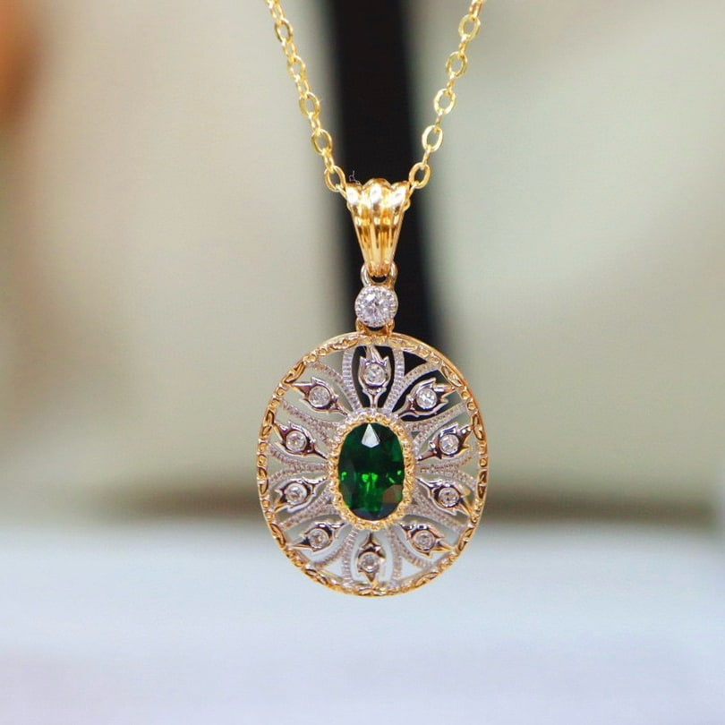 14k Gold 0.64 Ctw Vivid Green Natural Tsavorite & Diamond Pendant( Without Chain ): Ref:230951190 // gold content:14k gold // main gemstone:tsavorite // shape:oval // carat weight:0. 56ct // color:vivid green // treatment:natural // // adjacent gemstone 2 : diamond // shape:round //
