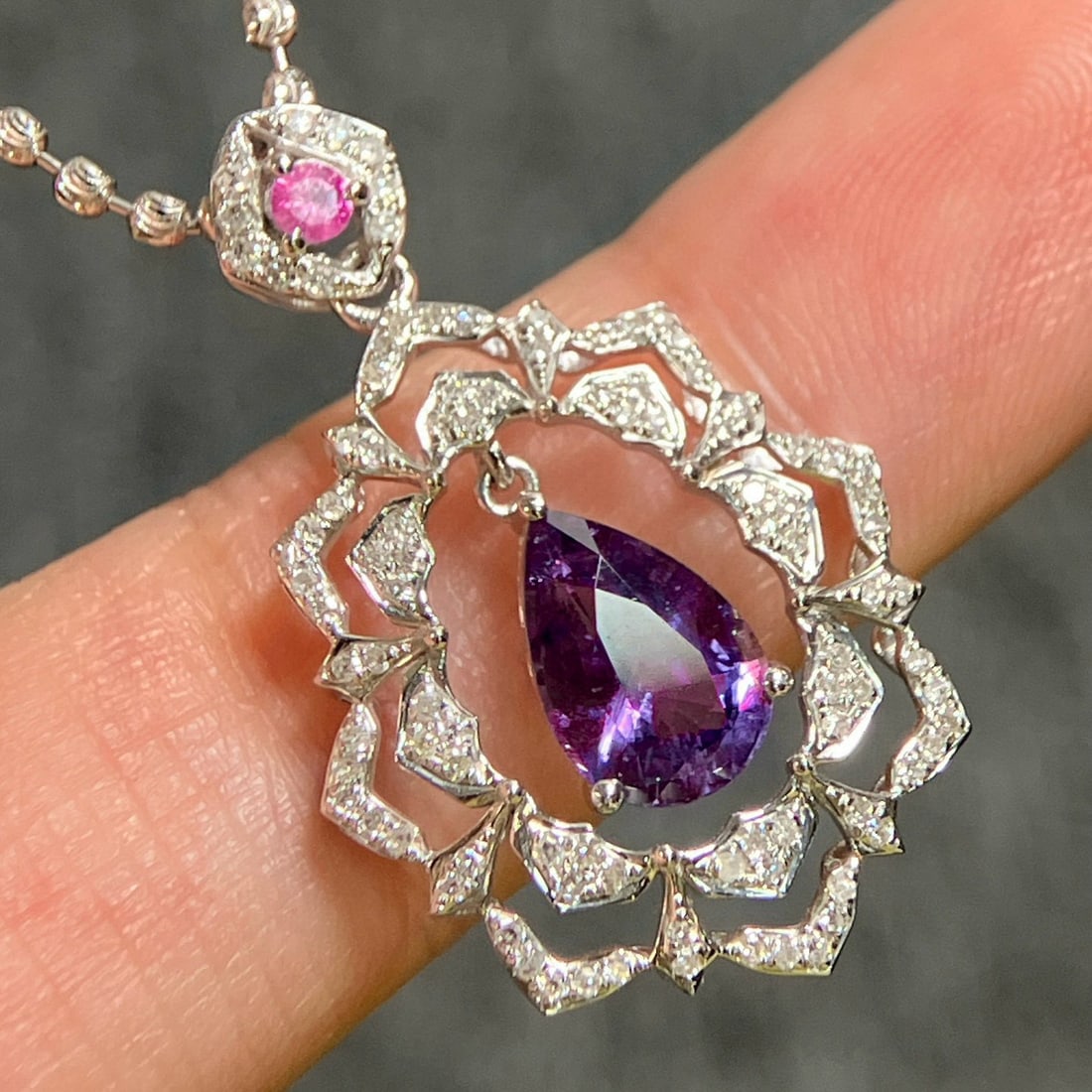 14k Gold 1.99 Ctw Natural Sapphire & Diamond Pendant( Without Chain ): Ref:230951227 // gold content:14k gold // main gemstone:sapphire // shape:pear // carat weight:1. 65ct // color:purple // treatment:natural // // adjacent gemstone 2 : diamond // shape:round //