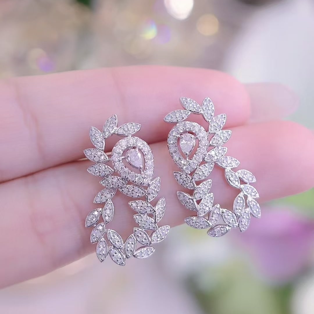 14k Gold 1.5 Ct Natural H Diamond Earrings: Ref:230951236 // gold content:14k gold // main gemstone:diamond // shape:multiply // carat weight:1. 5ct // clarity grade:vs-si // color:h // treatment:natural // Condition: NewLow Estimate: