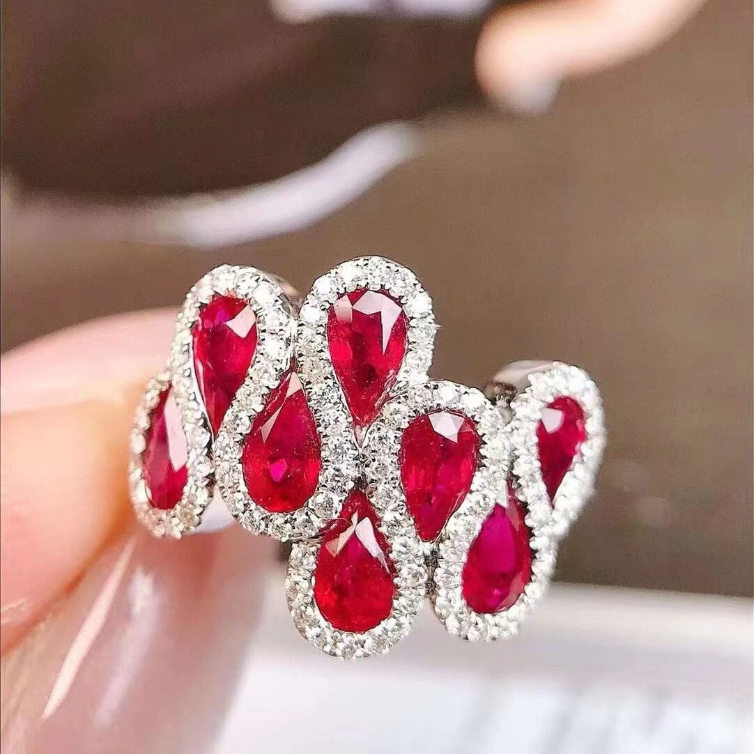 14k Gold 2.52 Ctw Vivid Red Natural Ruby & Diamond Ring: Ref:230952163 // gold content:14k gold // ring size:7. 25us // // main gemstone:ruby // shape:pear // carat weight:2. 20ct // color:vivid red // treatment:natural // // adjacent gemstone 2 :