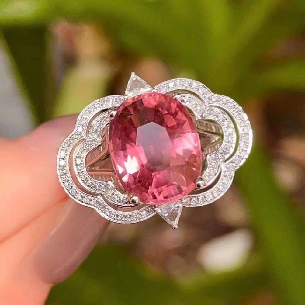 14k Gold 5.85 Ct Natural Tourmaline & Diamond Ring: Ref:230952167 // gold content:14k gold // ring size:7. 25us // // main gemstone:tourmaline // shape:oval // carat weight:5. 85ct // color:pink // treatment:natural // // adjacent gemstone 2 :