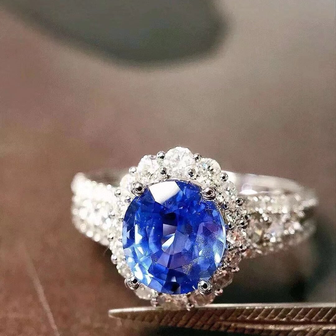 14k Gold 2.40 Ctw Natural Sapphire & Diamond Ring: Ref:230952215 // gold content:14k gold // ring size:7. 25us // // main gemstone:sapphire // shape:oval // carat weight:1. 80ct // color:cornflower blue // treatment:natural // // adjacent gemstone