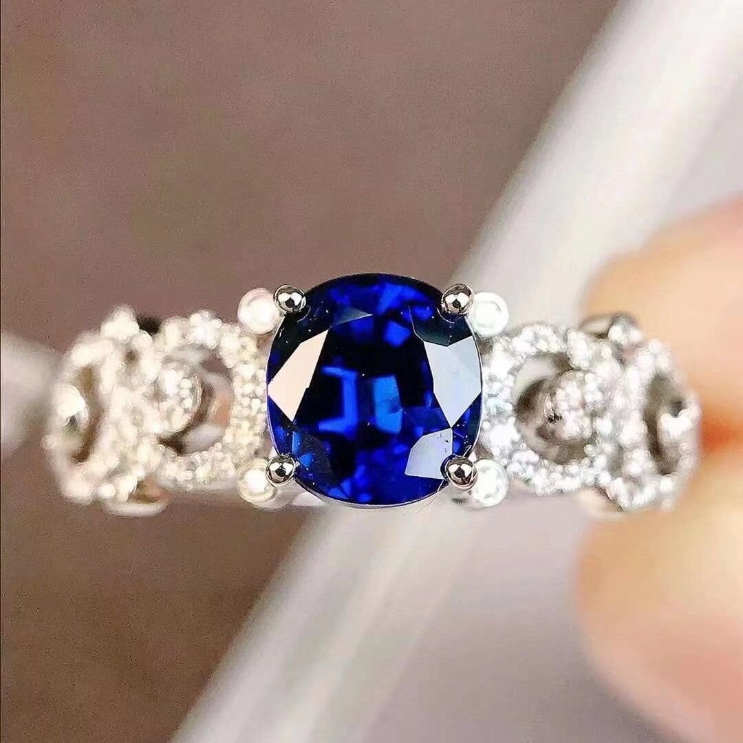 14k Gold 1.08 Ctw Natural Sapphire & Diamond Ring: Ref:230952229 // gold content:14k gold // ring size:7. 25us // // main gemstone:sapphire // shape:oval // carat weight:0. 91ct // color:royal blue // treatment:natural // // adjacent gemstone 2 :