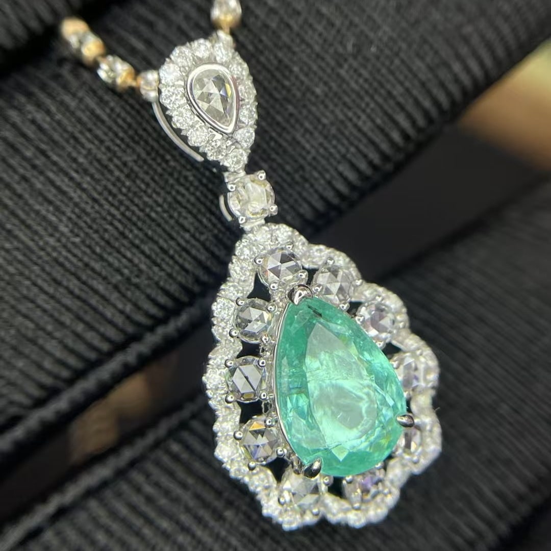 14k Gold 2.11 Ctw Natural Paraiba Tourmaline & Diamond Pendant( Without Chain ): Ref:230952260 // gold content:14k gold // main gemstone:paraiba tourmaline // shape:pear // carat weight:1. 44ct // color:green // treatment:natural // // adjacent gemstone 2 : diamond //