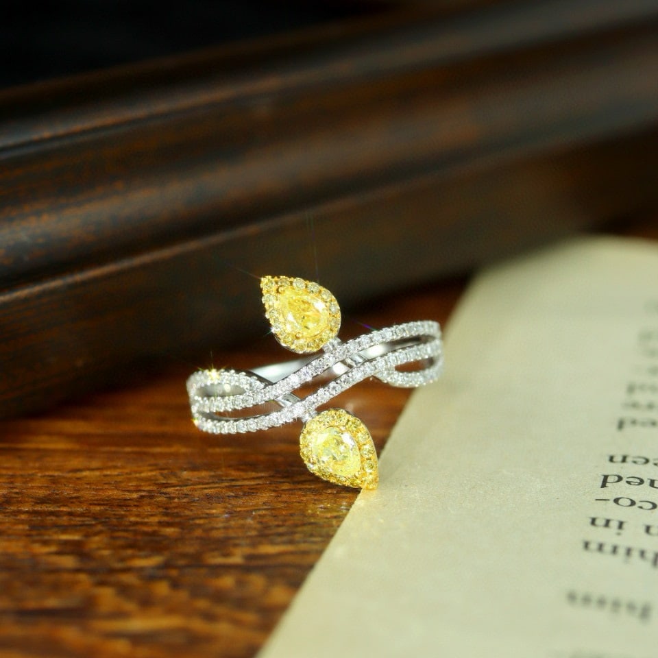 14k Gold 0.67 Ctw Natural Yellow Diamond & Diamond Ring: Ref:230952315 // gold content:14k gold // ring size:7. 25us // // main gemstone:yellow diamond // shape:pear // carat weight:0. 32ct // color:yellow // treatment:natural // // adjacent gemstone 2