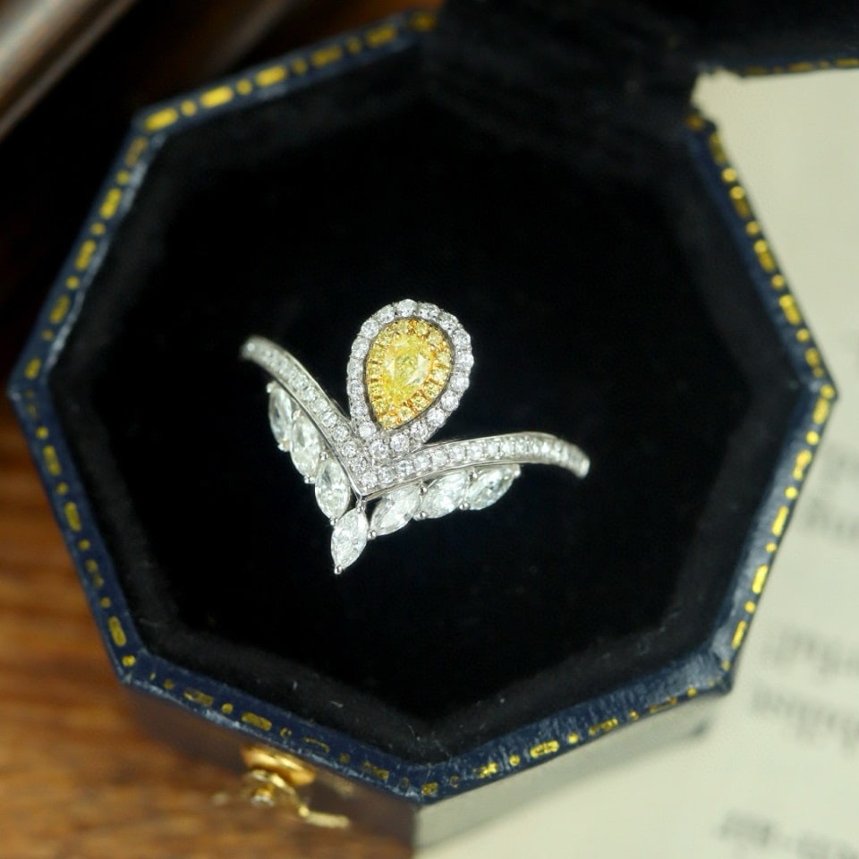 14k Gold 0.67 Ctw Natural Yellow Diamond & Diamond Ring: Ref:230952333 // gold content:14k gold // ring size:7. 25us // // main gemstone:yellow diamond // shape:pear // carat weight:0. 12ct // color:yellow // treatment:natural // // adjacent gemstone 2