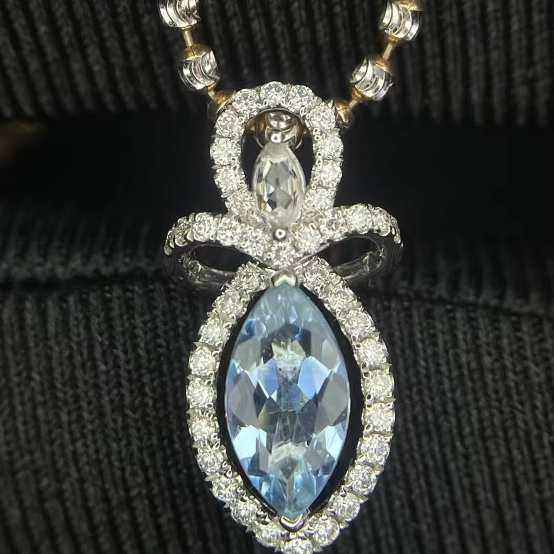 14k Gold 0.50 Ct Natural Aquamarine & Diamond Pendant( Without Chain ): Ref:230952341 // gold content:14k gold // main gemstone:aquamarine // shape:marquise // carat weight:0. 50ct // color:santa maria color // treatment:natural // // adjacent gemstone 2 : diamond //