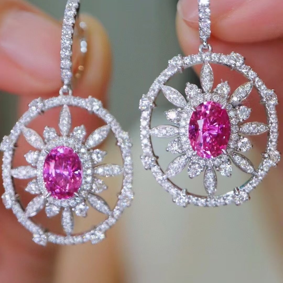 14k Gold 3.61 Ctw Natural Padparadscha Sapphire & Diamond Earrings: Ref:230952350 // gold content:14k gold // main gemstone:padparadscha sapphire // shape:oval // carat weight:2. 12ct // color:orangish pink // treatment:natural // // adjacent gemstone 2 : diamond // s