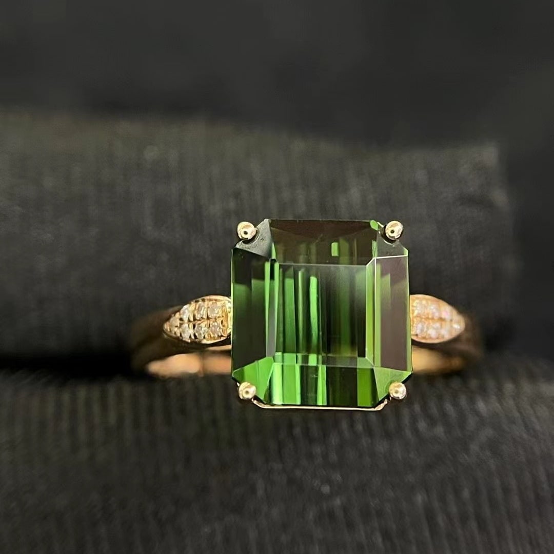14k Gold 2.99 Ct Natural Tourmaline & Diamond Ring: Ref:230952370 // gold content:14k gold // ring size:7. 25us // // main gemstone:tourmaline // shape:octagonal // carat weight:2. 99ct // color:green // treatment:natural // // adjacent gemstone 2