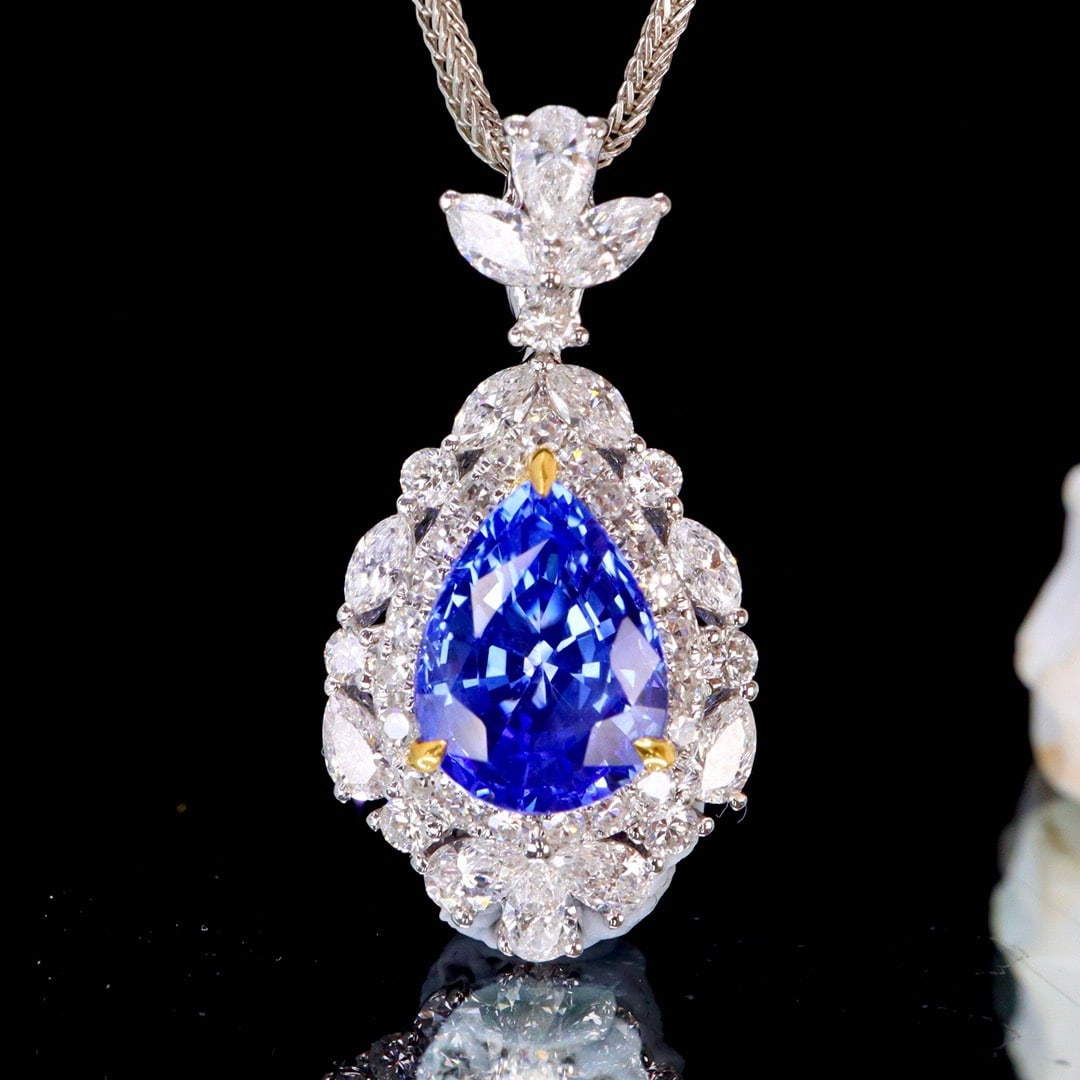 14k Gold 2.22 Ctw Natural Sapphire & Diamond Pendant( Without Chain ): Ref:230952387 // gold content:14k gold // main gemstone:sapphire // shape:pear // carat weight:1. 55ct // color:cornflower blue // treatment:natural // // adjacent gemstone 2 : diamond //