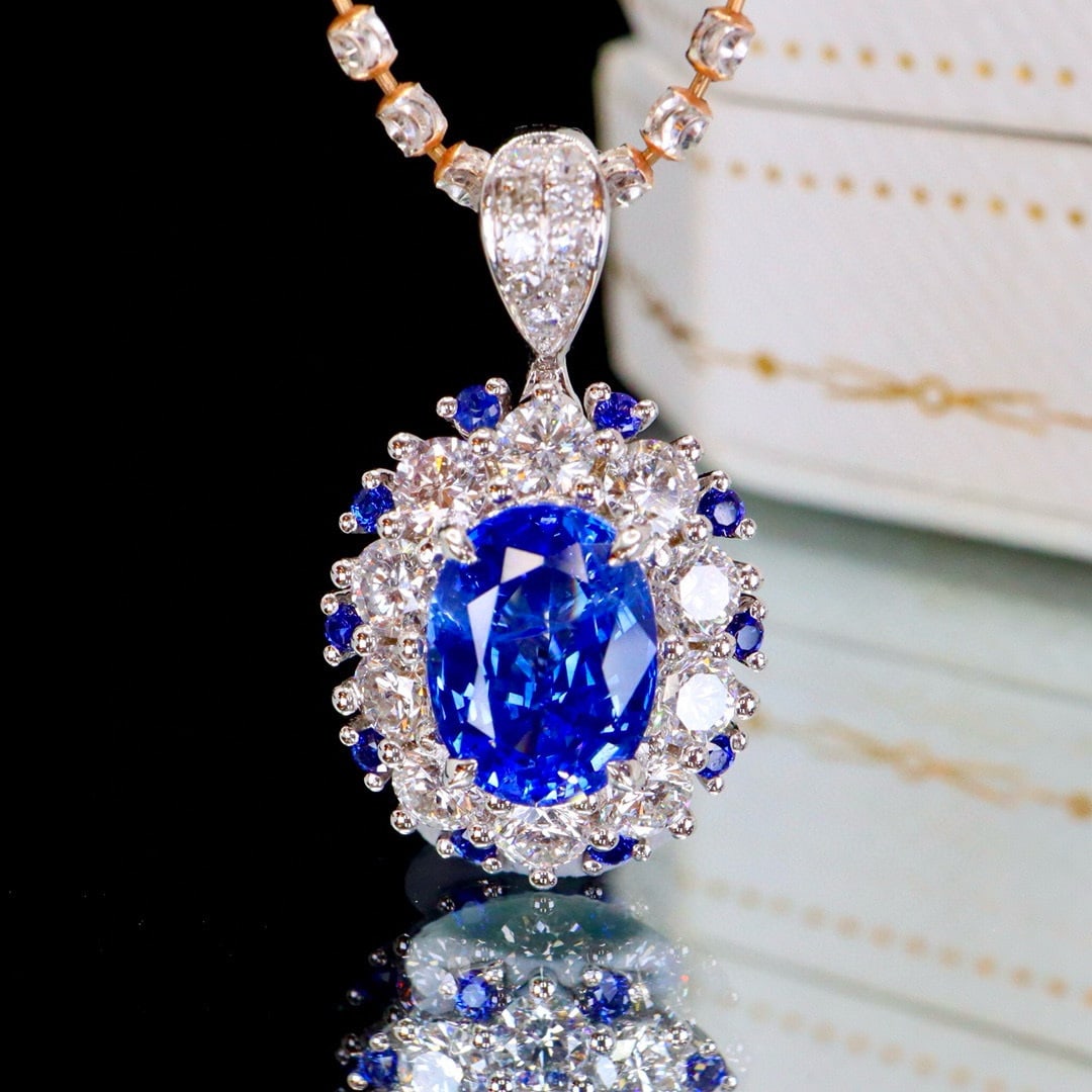 14k Gold 2.55 Ctw Natural Sapphire & Diamond Pendant( Without Chain ): Ref:230952394 // gold content:14k gold // main gemstone:sapphire // shape:oval // carat weight:1. 70ct // color:royal blue // treatment:natural // // adjacent gemstone 2 : diamond // shape:round //
