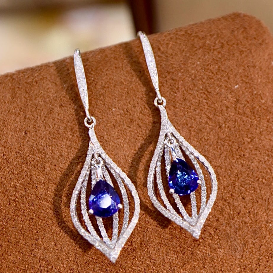 14k Gold 2.10 Ctw Natural Sapphire & Diamond Earrings: Ref:230952432 // gold content:14k gold // main gemstone:sapphire // shape:pear // carat weight:1. 32ct // color:royal blue // treatment:natural // // adjacent gemstone 2 : diamond // shape:round //