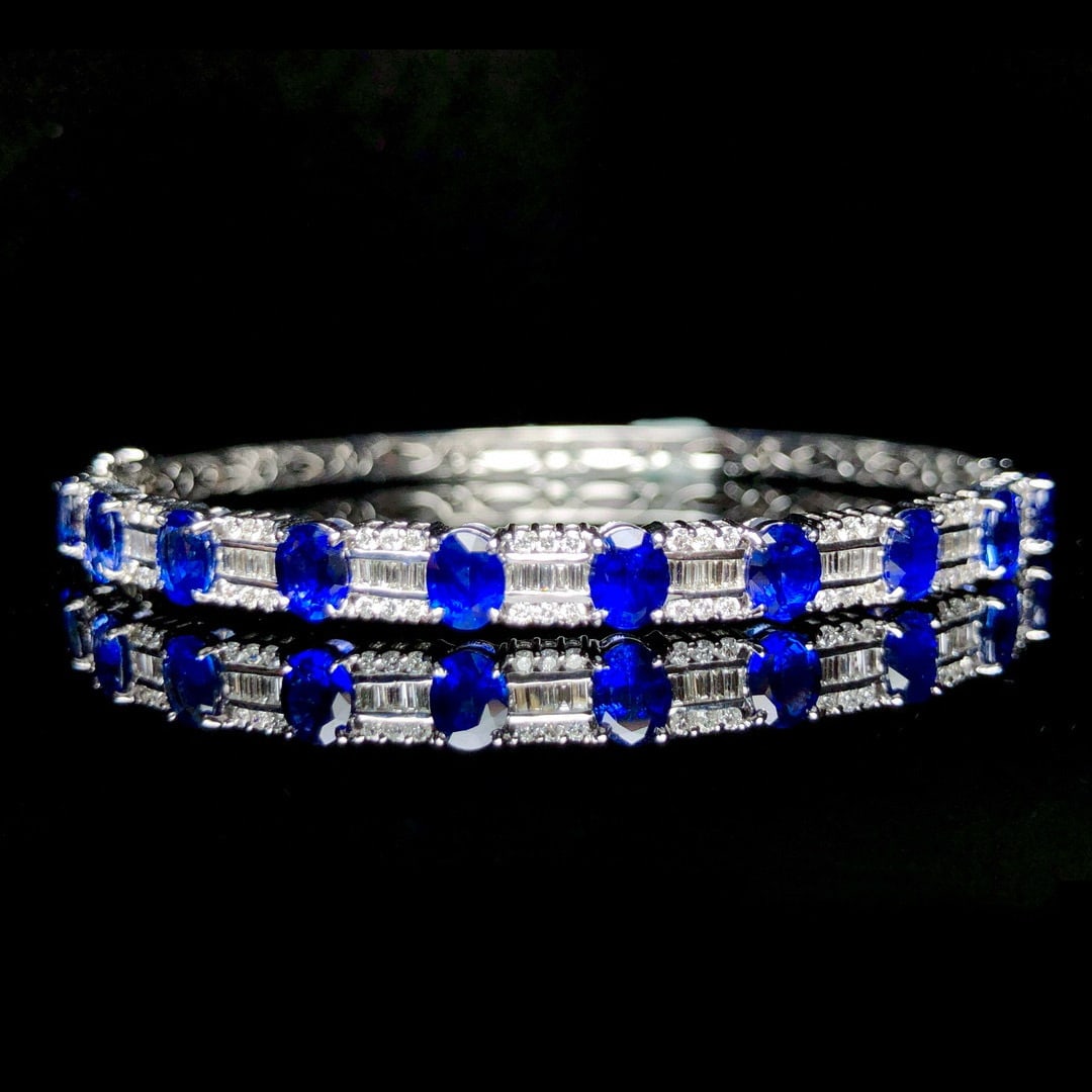 14k Gold 4.61 Ctw Natural Sapphire & Diamond Bracelet: Ref:230953001 // gold content:14k gold // main gemstone:sapphire // shape:oval // carat weight:3. 84ct // color:royal blue // treatment:natural // // adjacent gemstone 2 : diamond // shape:multiply //
