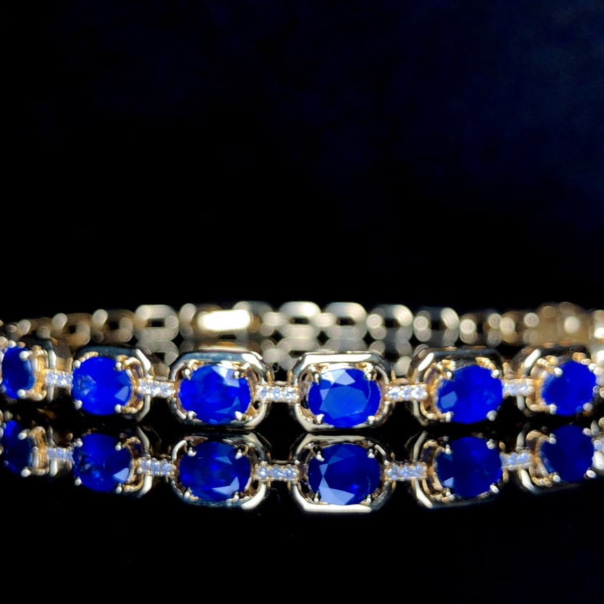 14k Gold 5.71 Ctw Natural Sapphire & Diamond Bracelet: Ref:230953094 // gold content:14k gold // main gemstone:sapphire // shape:oval // carat weight:5. 56ct // color:royal blue // treatment:natural // // adjacent gemstone 2 : diamond // shape:round // ca
