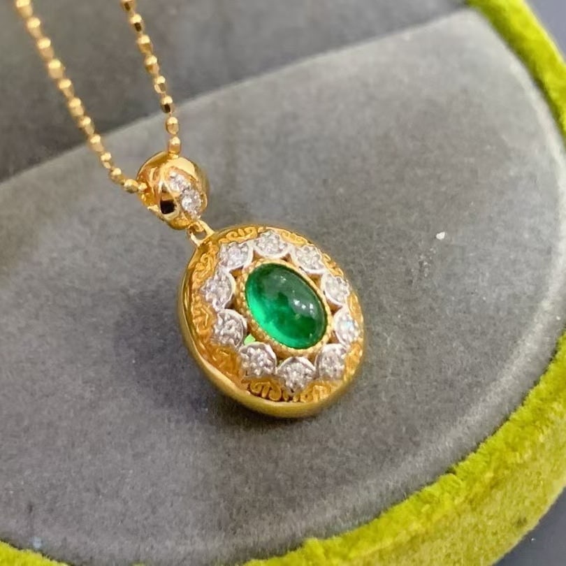 14k Gold 0.38 Ctw Natural Emerald & Diamond Pendant( Without Chain ): Ref:230953148 // gold content:14k gold // main gemstone:emerald // shape:oval // carat weight:0. 3ct // color:green // treatment:natural // // adjacent gemstone 2 : diamond // shape:round // carat