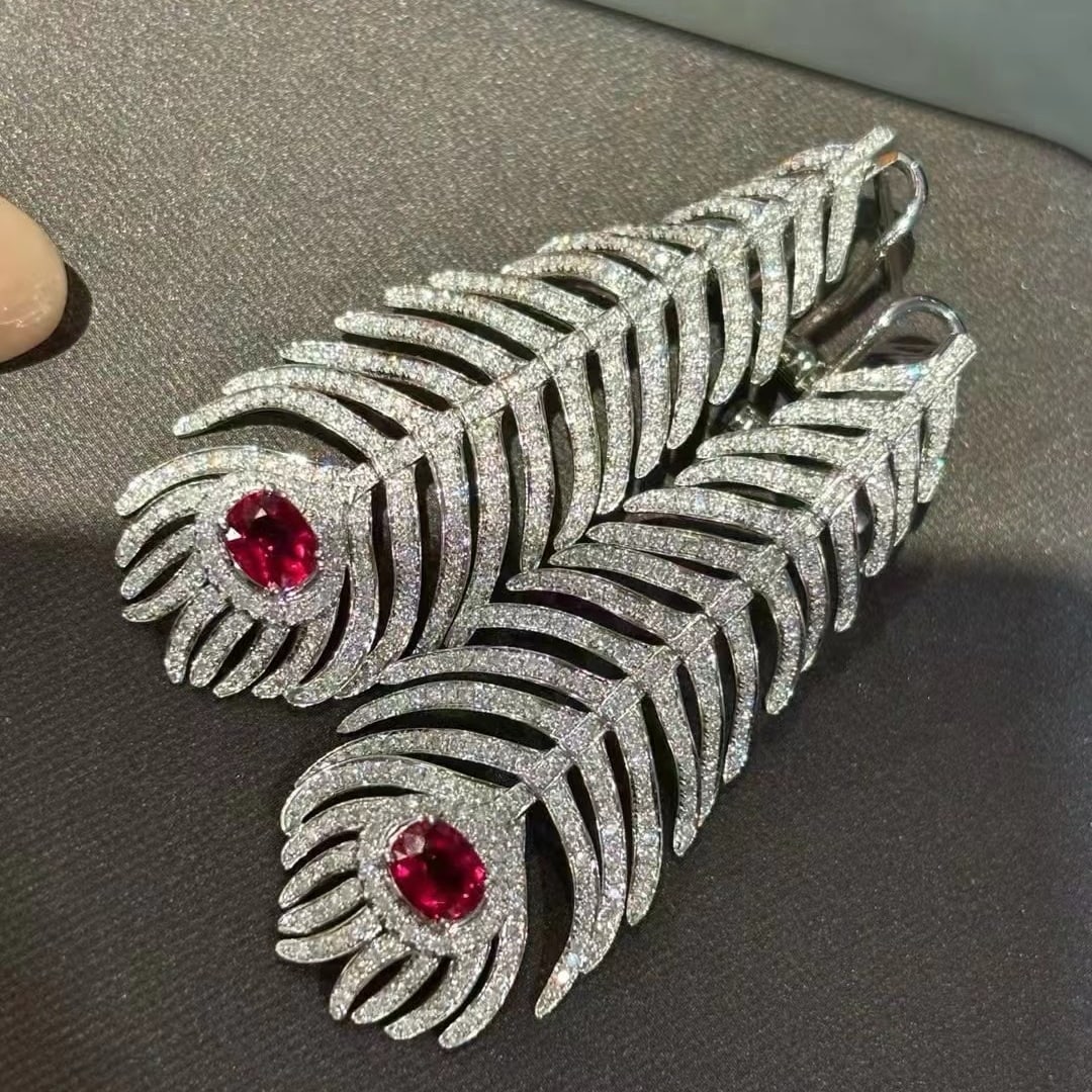 14k Gold 1.8 Ct Natural Ruby & Diamond Earrings: Ref:230953182 // gold content:14k gold // main gemstone:ruby // shape:oval // carat weight:1. 8ct // color:red // treatment:natural // // adjacent gemstone 2 : diamond // shape:round // clarity