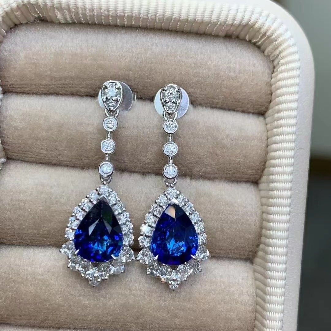 14k Gold 3.64 Ctw Natural Sapphire & Diamond Earrings: Ref:230953213 // gold content:14k gold // main gemstone:sapphire // shape:pear // carat weight:2. 92ct // color:royal blue // treatment:natural // // adjacent gemstone 2 : diamond // shape:multiply