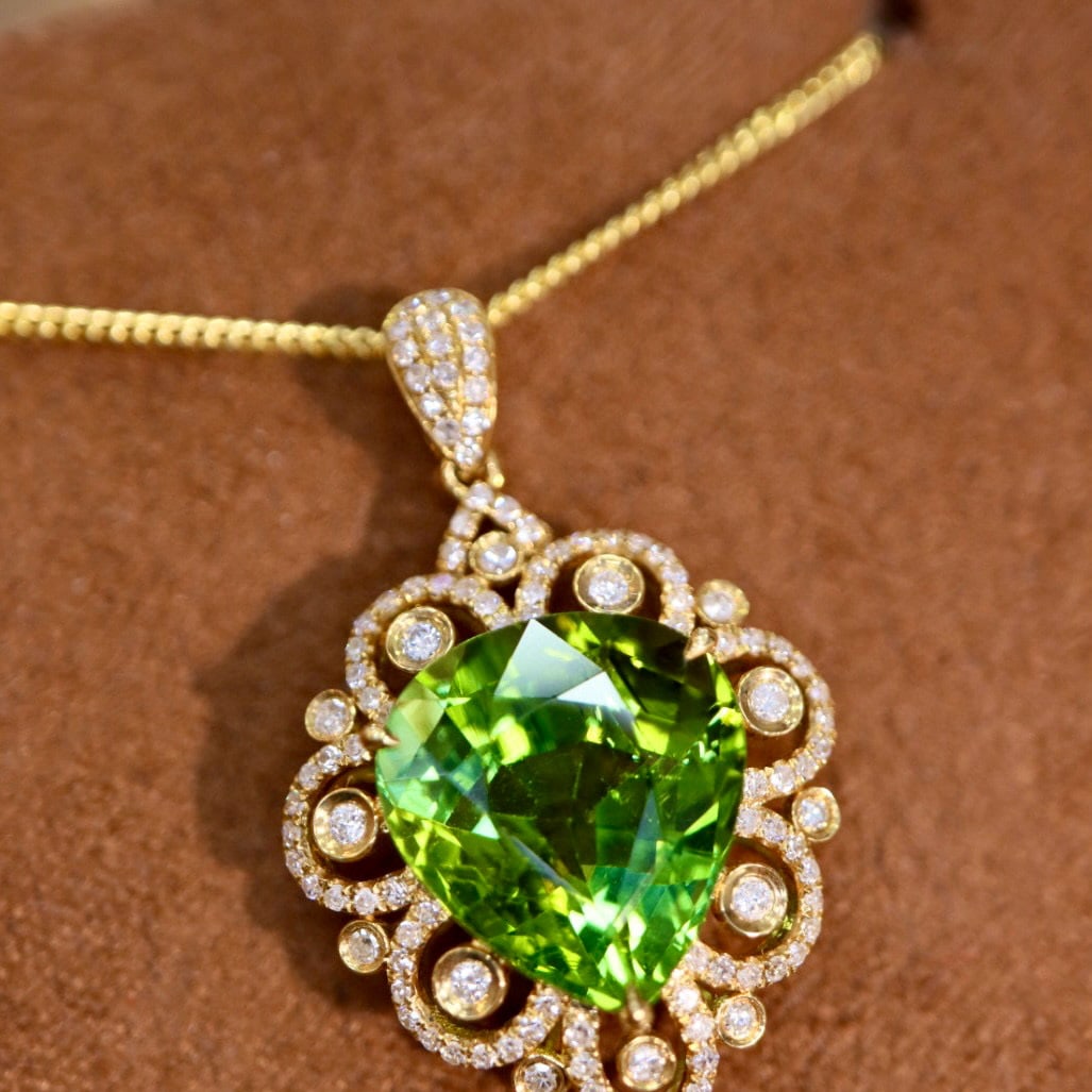 14k Gold 4.97 Ctw Natural Tourmaline & Diamond Pendant( Without Chain ): Ref:230954127 // gold content:14k gold // main gemstone:tourmaline // shape:pear // carat weight:4. 68ct // color:green // treatment:natural // // adjacent gemstone 2 : diamond // shape:round // carat
