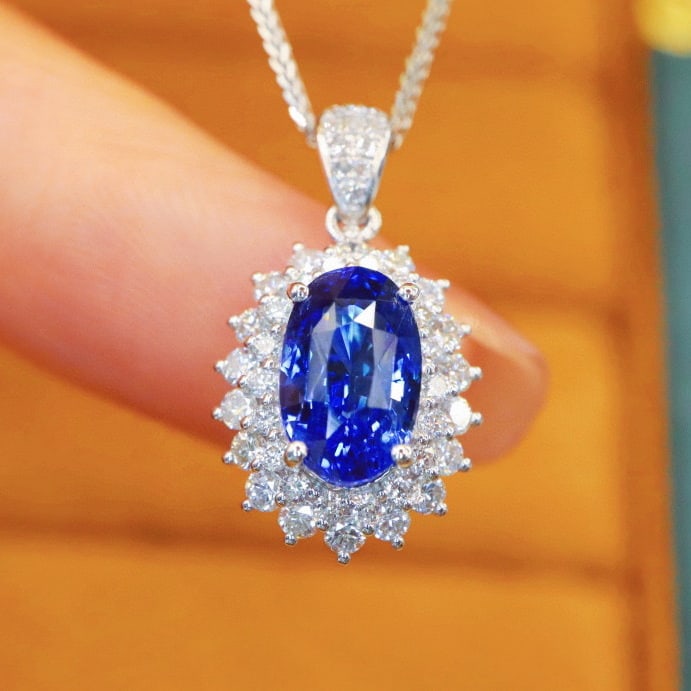 14k Gold 2.53 Ctw Natural Sapphire & Diamond Pendant( Without Chain ): Ref:230954149 // gold content:14k gold // main gemstone:sapphire // shape:oval // carat weight:2. 05ct // color:royal blue // treatment:natural // // adjacent gemstone 2 : diamond // number of stones: