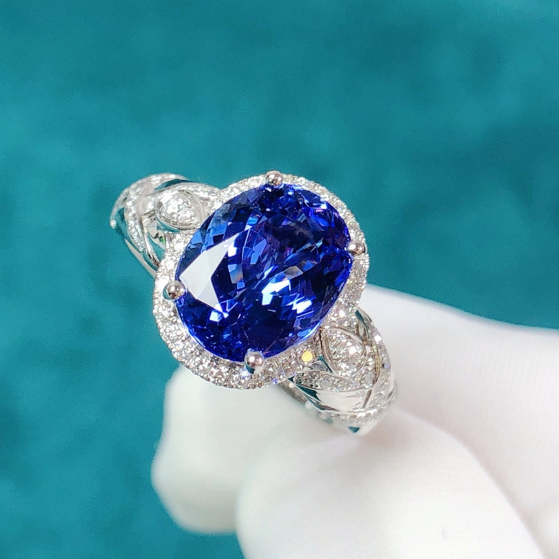 14k Gold 3.25 Ctw Natural Tanzanite & Diamond Ring: Ref:230954298 // gold content:14k gold // ring size:7. 25us // // main gemstone:tanzanite // shape:oval // carat weight:3. 0ct // color:blue // treatment:natural // // adjacent gemstone 2 :